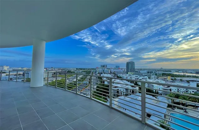 a group of people sitting in front of a store