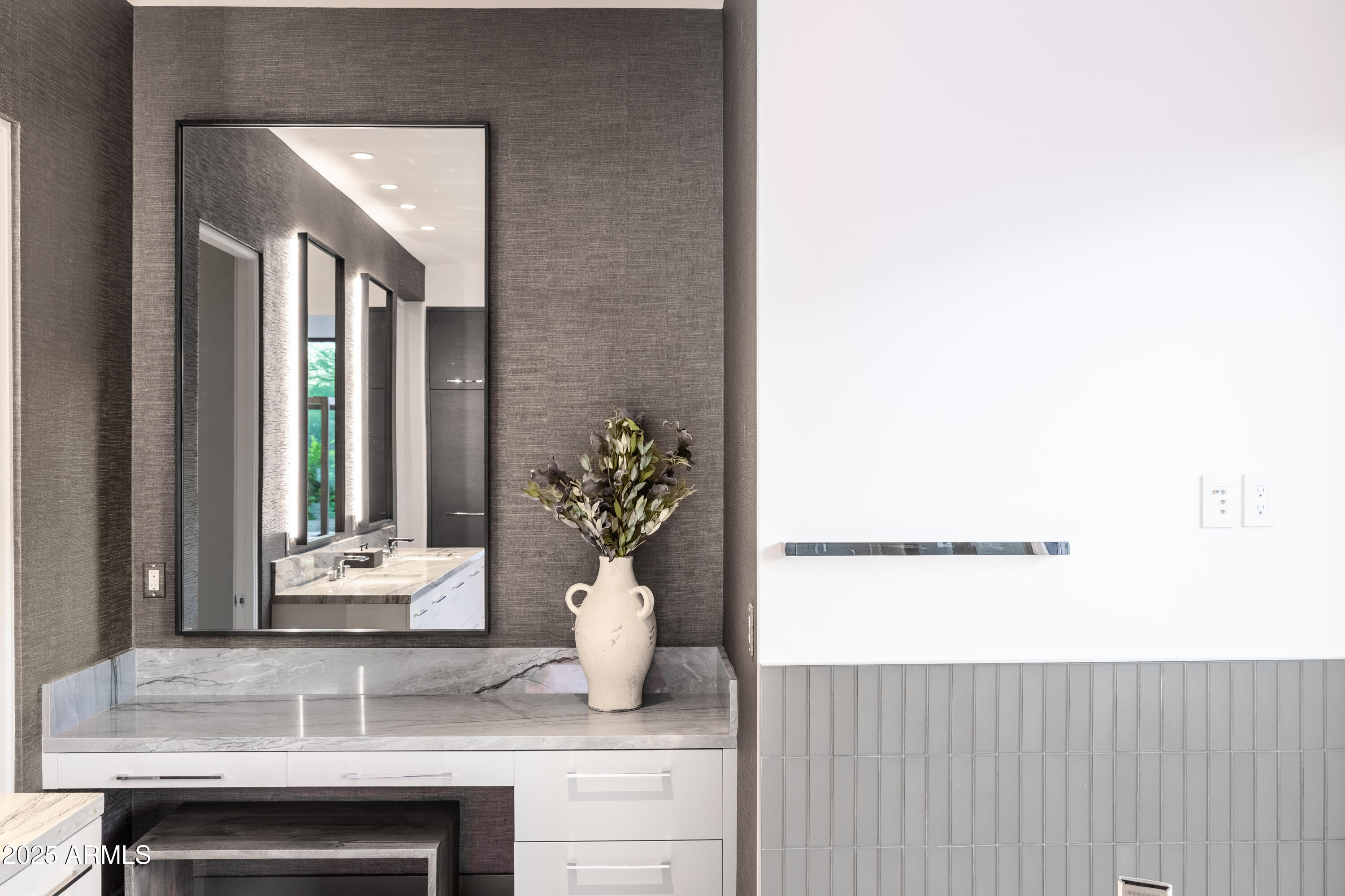 6850 East Joshua Tree Lane Paradise Valley, AZ 85253 - Photo 23 of 39 a bathroom with a sink and a mirror