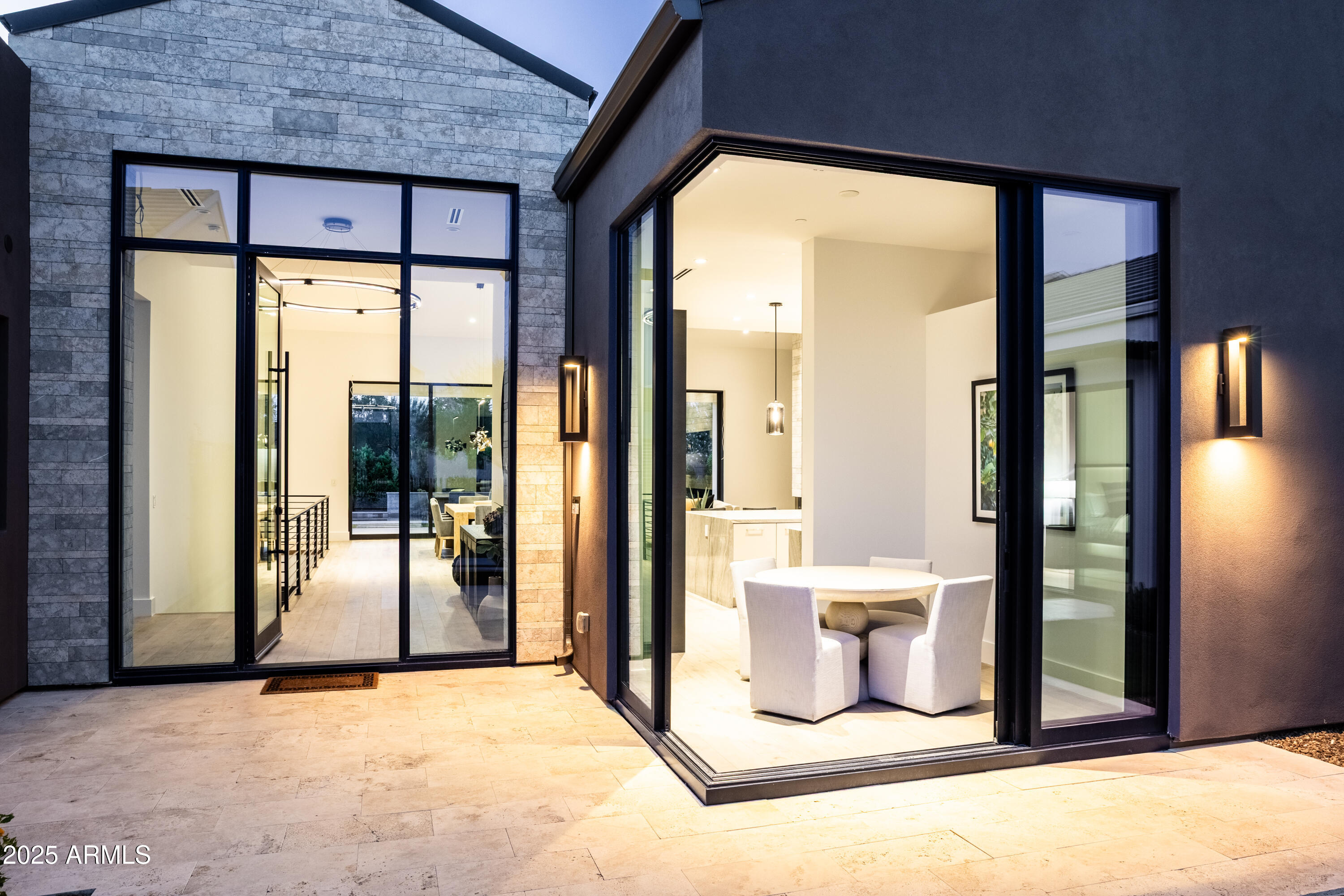6850 East Joshua Tree Lane Paradise Valley, AZ 85253 - Photo 4 of 39 a view of a room with a large window