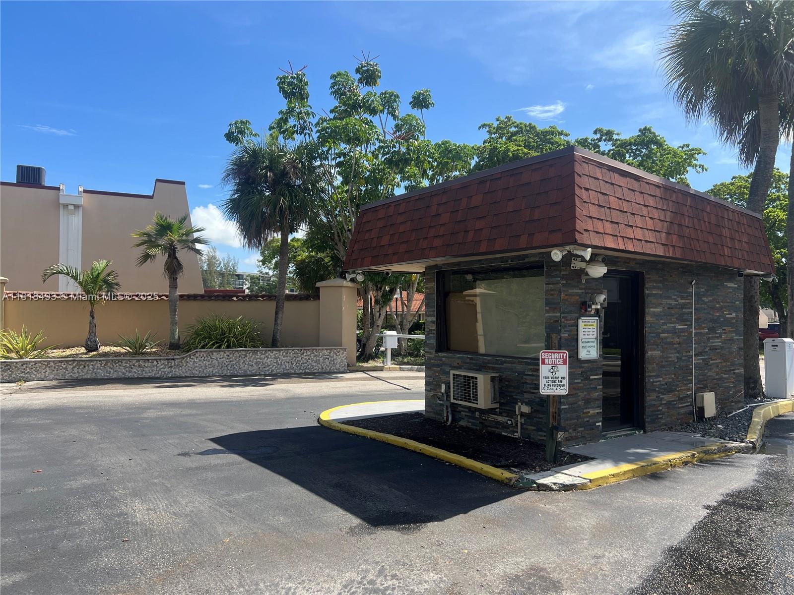 a view of house with outdoor space and sitting area