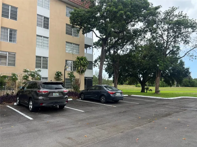 a car parked in front of a house