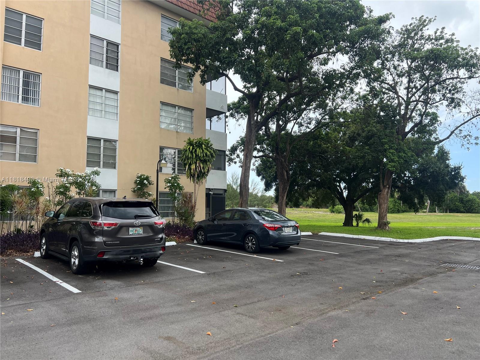 4160 Inverrary Drive, Unit 306 Lauderhill, FL 33319 - Photo 17 of 20 a car parked in front of a house