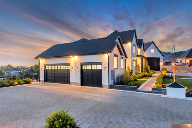 1720 Hillcrest Circle Mapleton, UT 84664 - Photo 5 of 116 View of front of home featuring decorative driveway, a garage, and brick siding