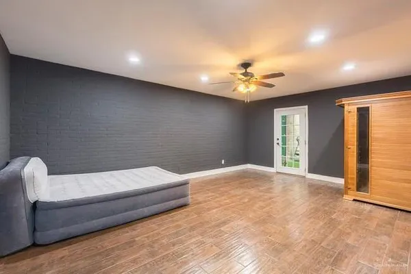 a living room with a couch and a flat screen tv