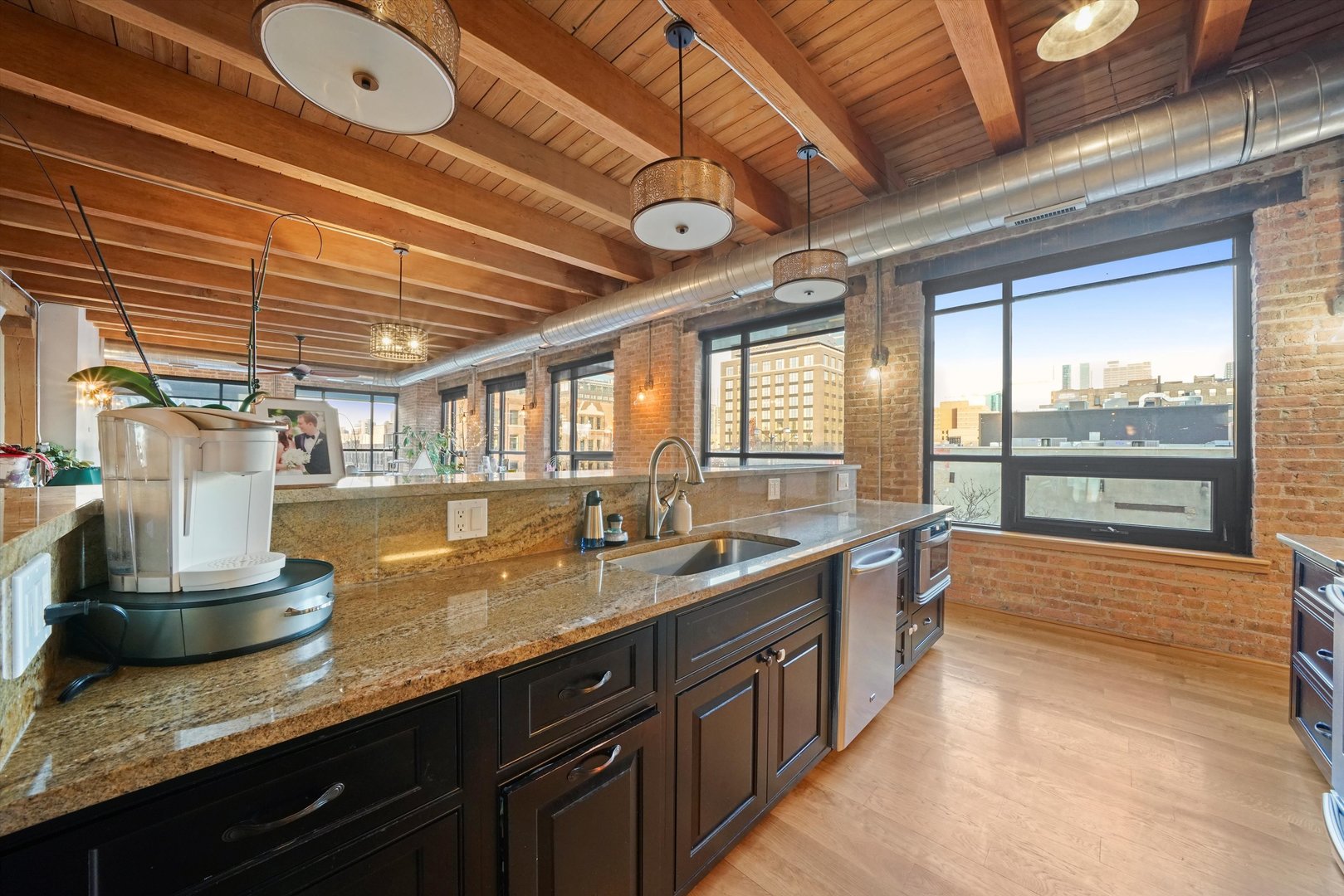 935 West Randolph Street, Unit PH Chicago, IL 60607 - Photo 11 of 35 a large kitchen with lots of counter space