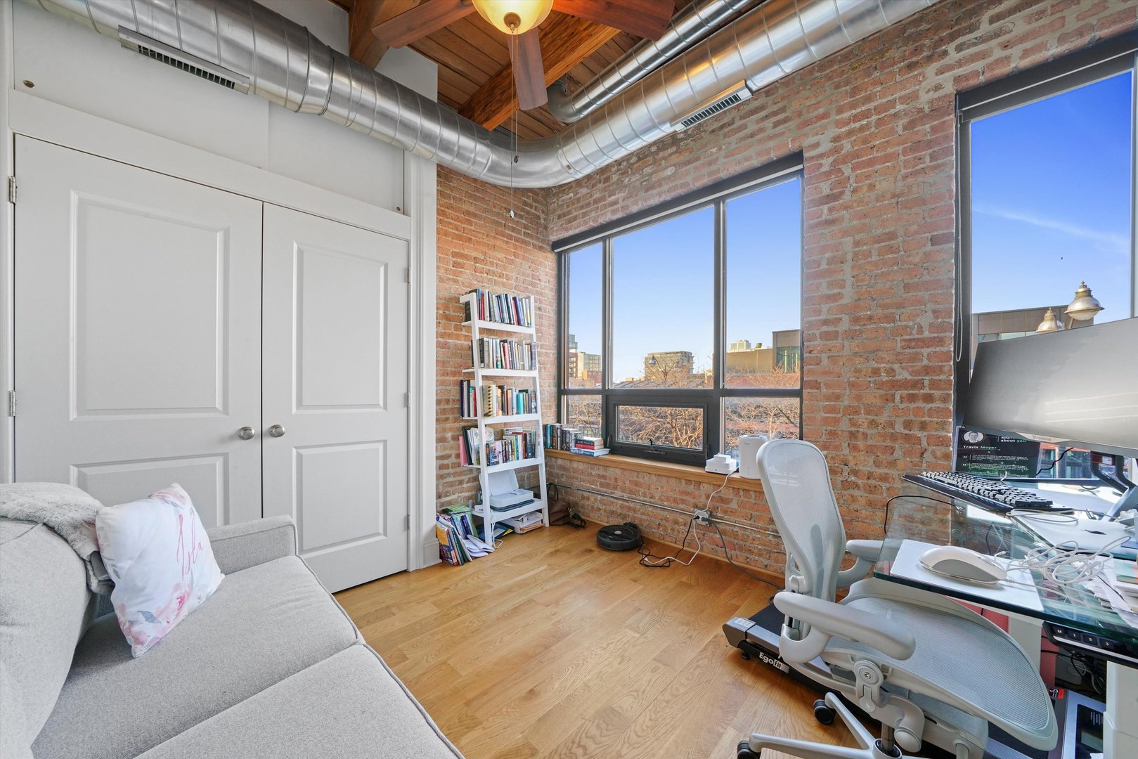 935 West Randolph Street, Unit PH Chicago, IL 60607 - Photo 20 of 35 a bedroom with furniture and a window