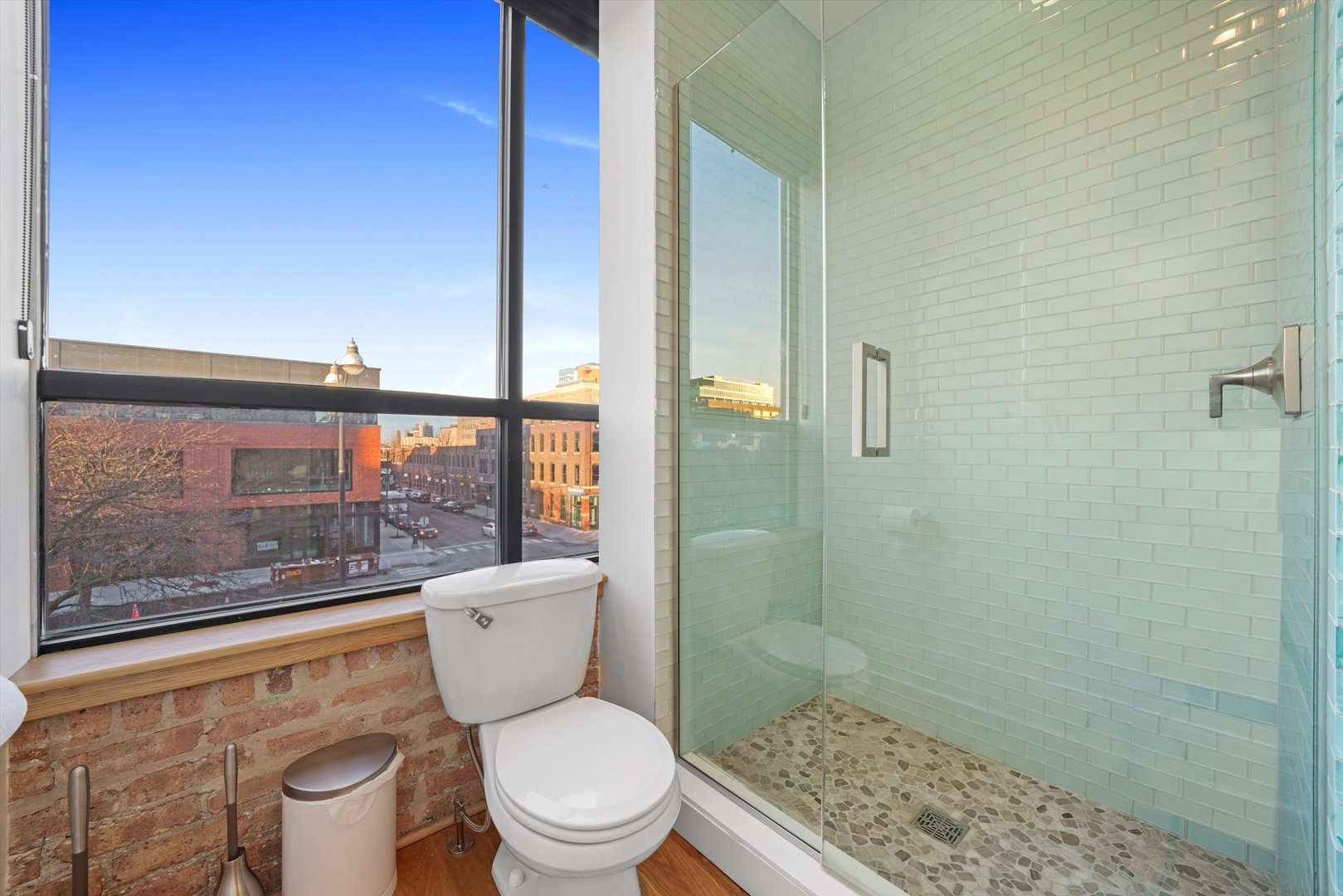 935 West Randolph Street, Unit PH Chicago, IL 60607 - Photo 22 of 35 a bathroom with a toilet and a shower