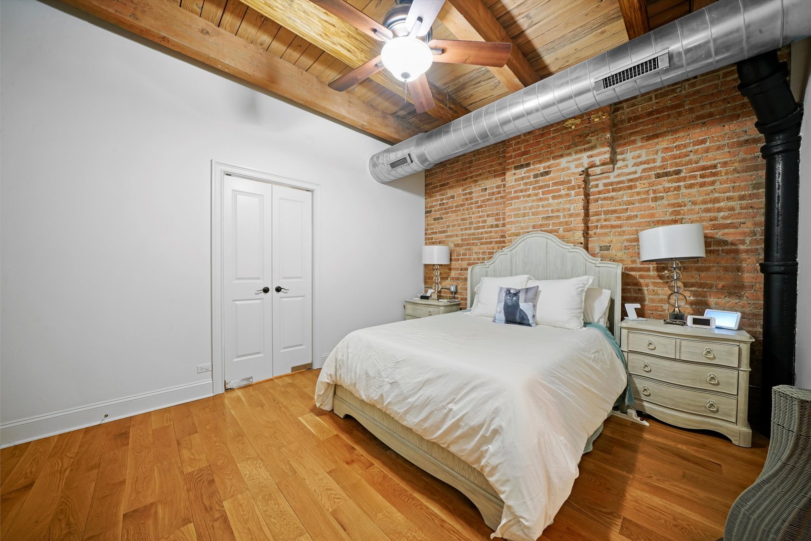 935 West Randolph Street, Unit PH Chicago, IL 60607 - Photo 23 of 35 a bedroom with a bed and a window