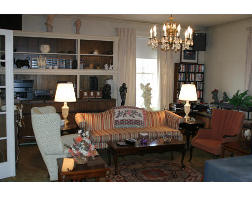 83 Ridgewood Terrace Springfield, MA 01105 - Photo 4 of 8 a bedroom with furniture and chandelier