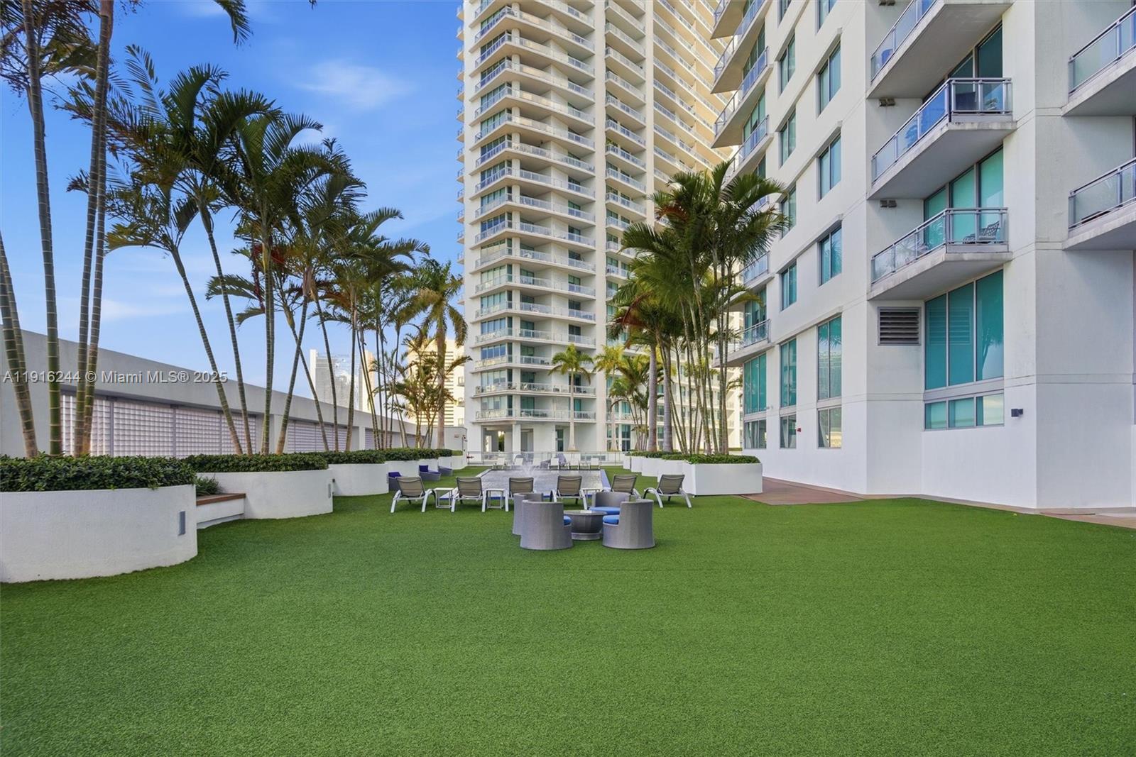 92 Southwest 3rd Street, Unit 1604 Miami, FL 33130 - Photo 29 of 53 a garden view with a seating space