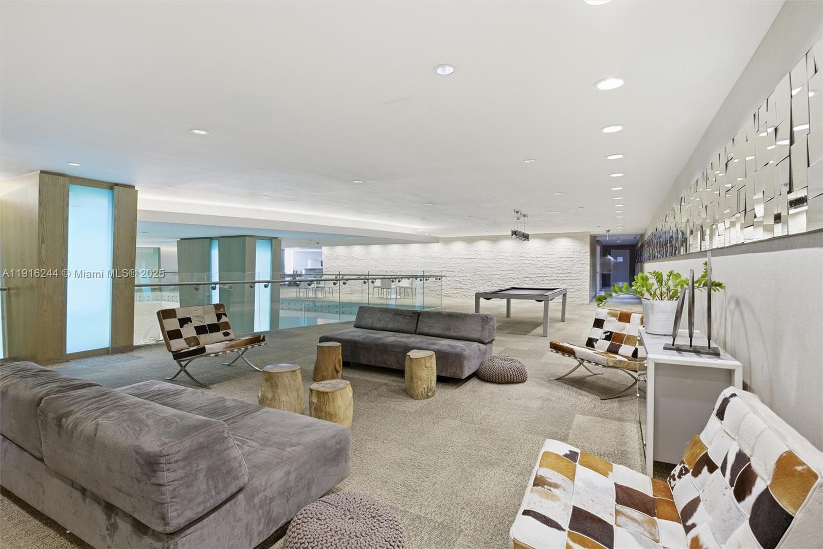 92 Southwest 3rd Street, Unit 1604 Miami, FL 33130 - Photo 44 of 53 a living room with furniture and kitchen view