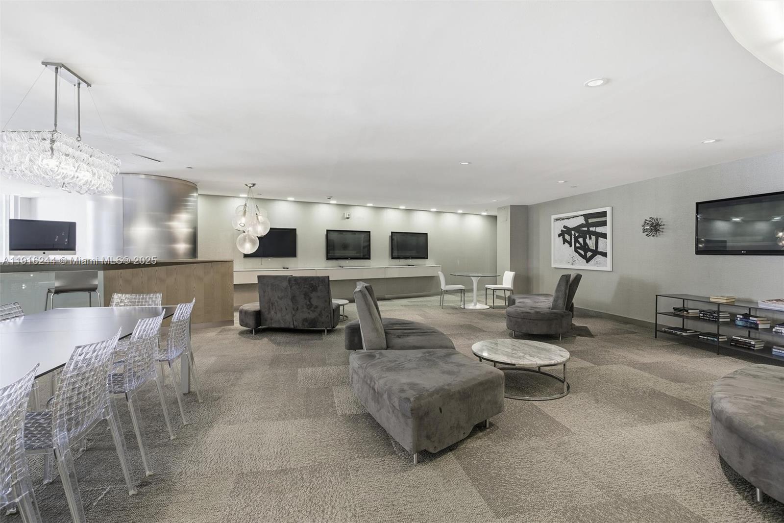 92 Southwest 3rd Street, Unit 1604 Miami, FL 33130 - Photo 46 of 53 a living room with furniture and a flat screen tv