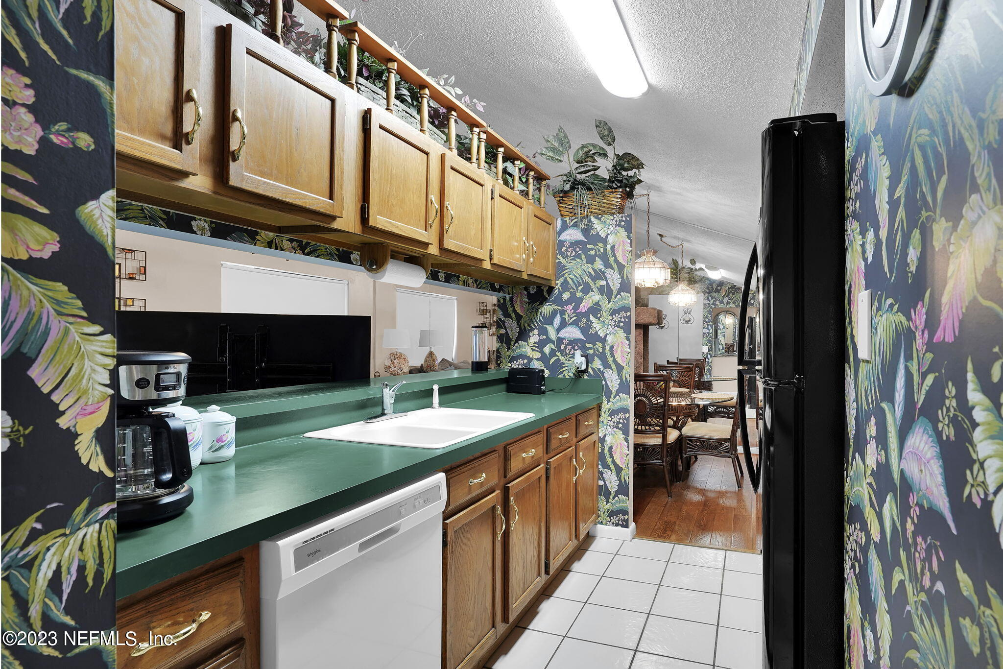10250 Lake Pines Road Jacksonville, FL 32257 - Photo 14 of 24 a kitchen with stainless steel appliances granite countertop a sink and stove