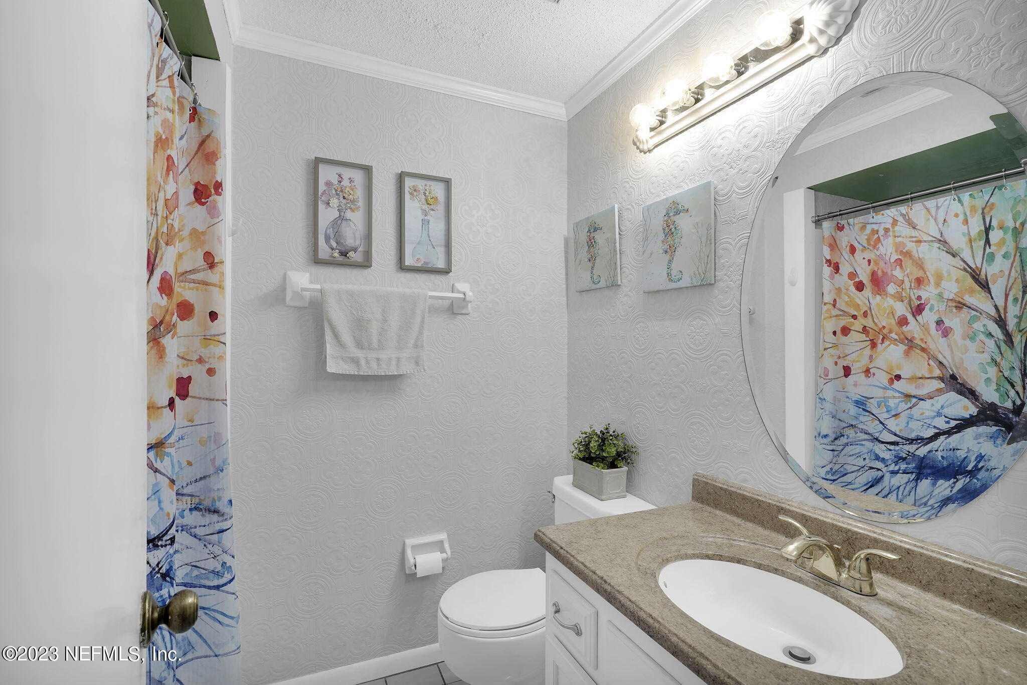 10250 Lake Pines Road Jacksonville, FL 32257 - Photo 19 of 24 a bathroom with a granite countertop toilet and a sink