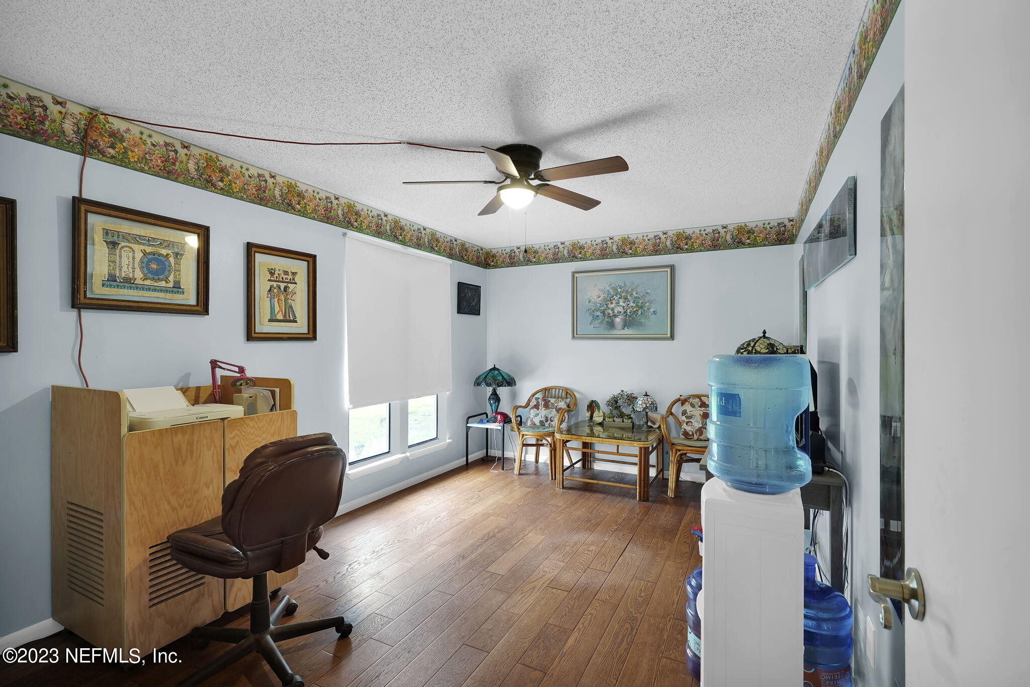 10250 Lake Pines Road Jacksonville, FL 32257 - Photo 20 of 24 a living room with furniture and wooden floor