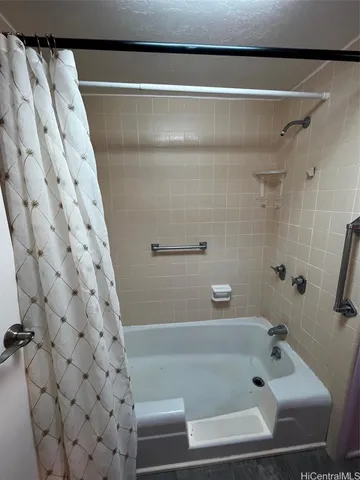a bathroom with a toilet and a sink