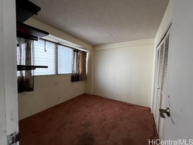 1615 Wilder Avenue, Unit 607 Honolulu, HI 96822 - Photo 16 of 19 an empty room with windows