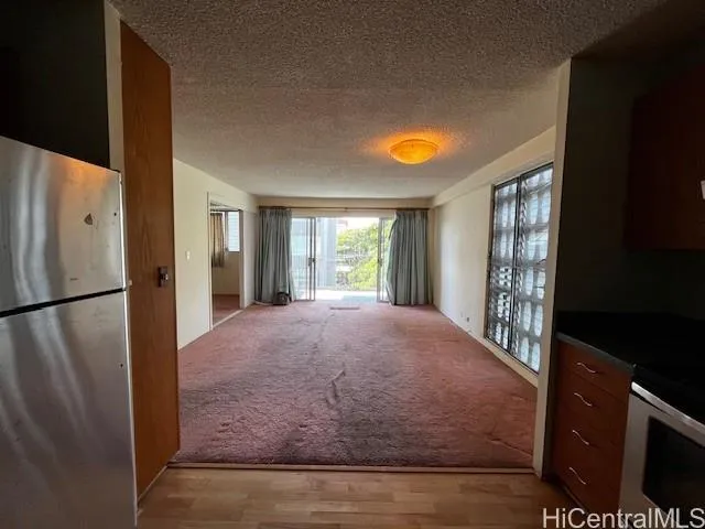 a view of empty room with a window