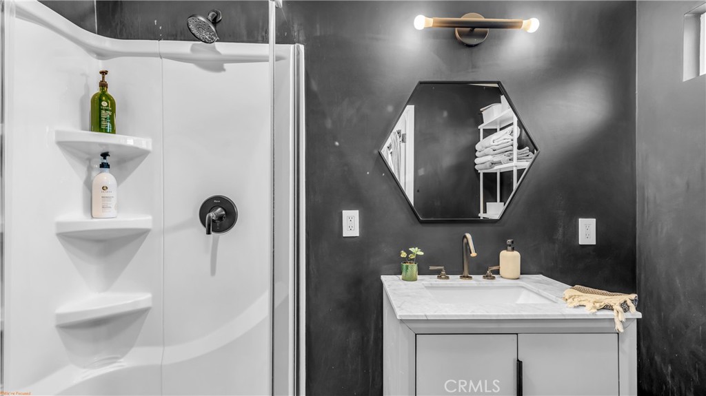 250 West Cortez Road Palm Springs, CA 92262 - Photo 33 of 54 a bathroom with a sink and mirror