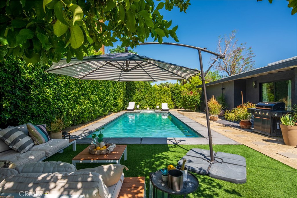250 West Cortez Road Palm Springs, CA 92262 - Photo 37 of 54 a view of a backyard with sitting area and furniture