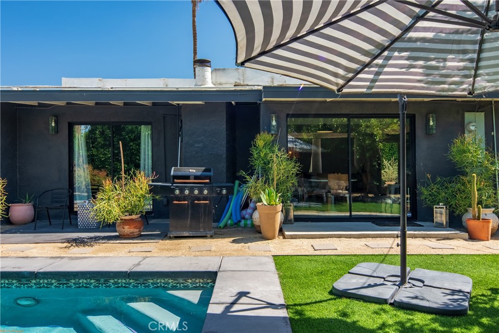 250 West Cortez Road Palm Springs, CA 92262 - Photo 38 of 54 a house view with a swimming pool