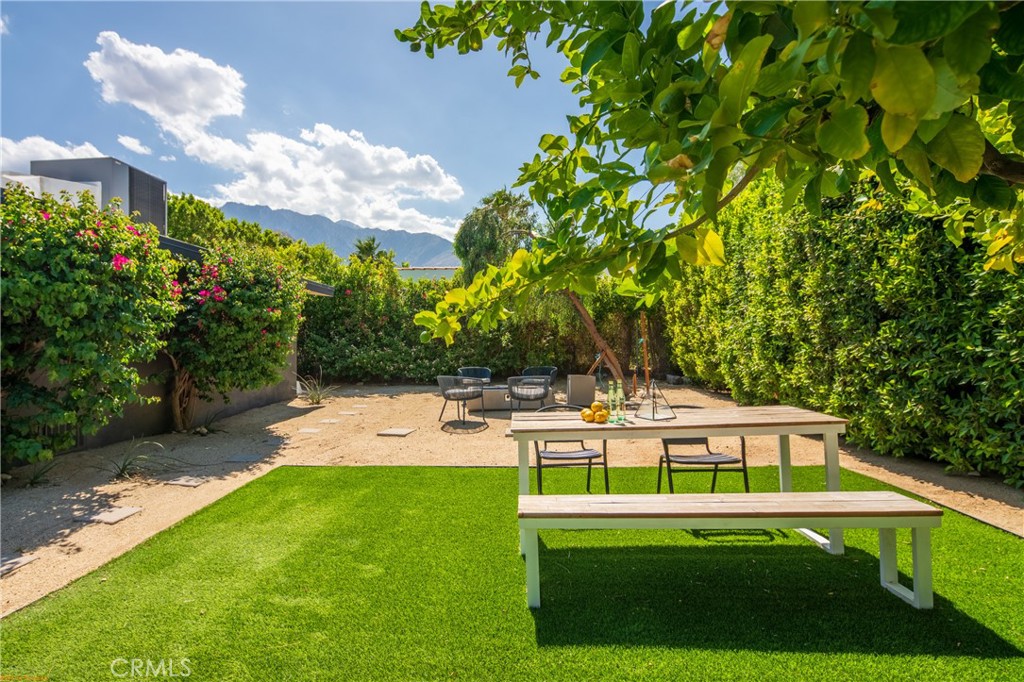 250 West Cortez Road Palm Springs, CA 92262 - Photo 45 of 54 a view of house with a yard