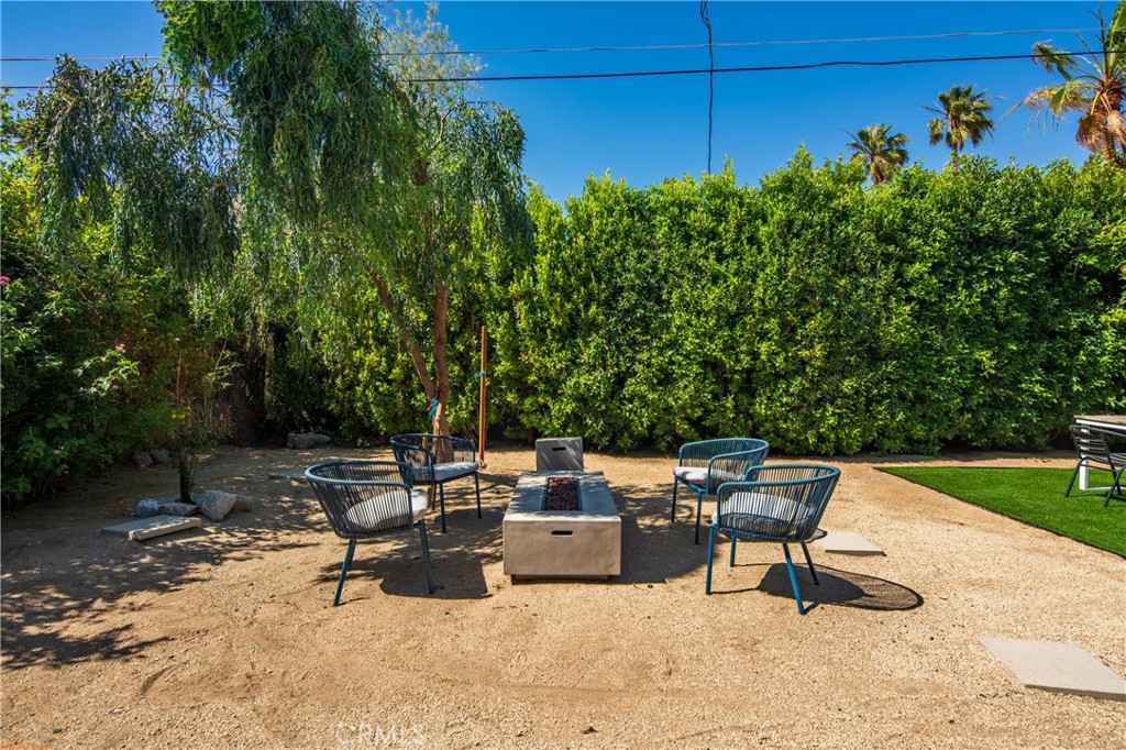 250 West Cortez Road Palm Springs, CA 92262 - Photo 46 of 54 a view of a backyard with sitting area