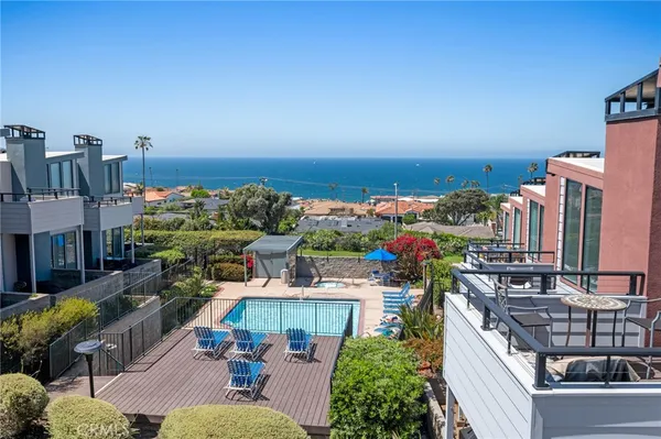 a view of a house with swimming pool