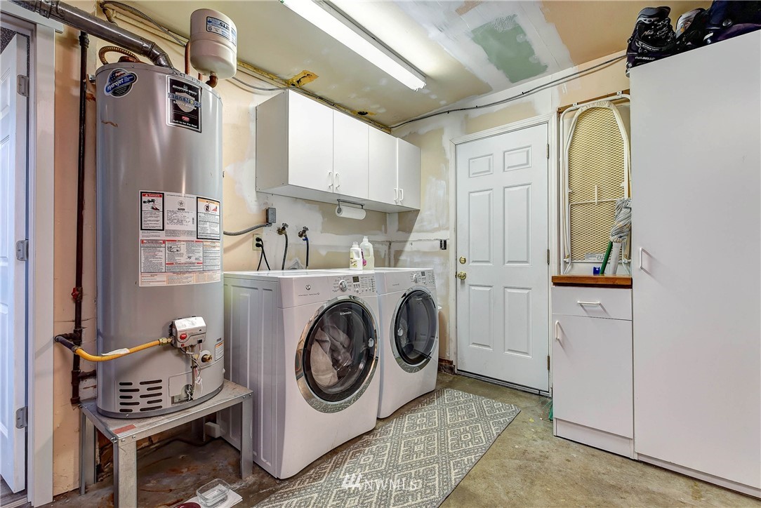 110 217th Place Southeast Bothell, WA 98021 - Photo 23 of 32 a utility room with dryer and washer
