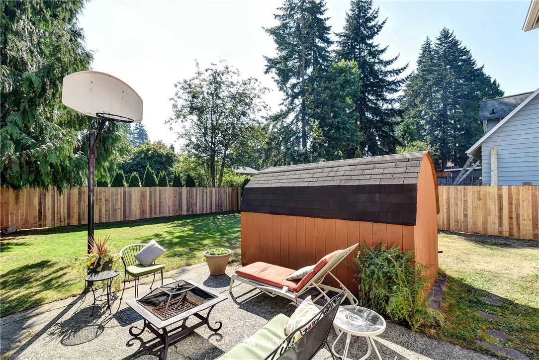 110 217th Place Southeast Bothell, WA 98021 - Photo 31 of 32 a view of backyard of house with seating space