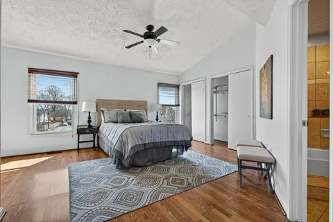a view of a work space with furniture and a potted plant