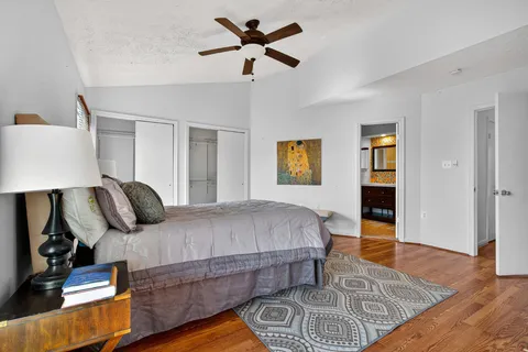 a view of a hallway with a potted plant