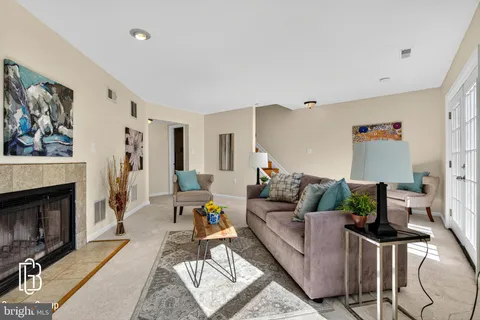 a view of a hallway with a potted plant
