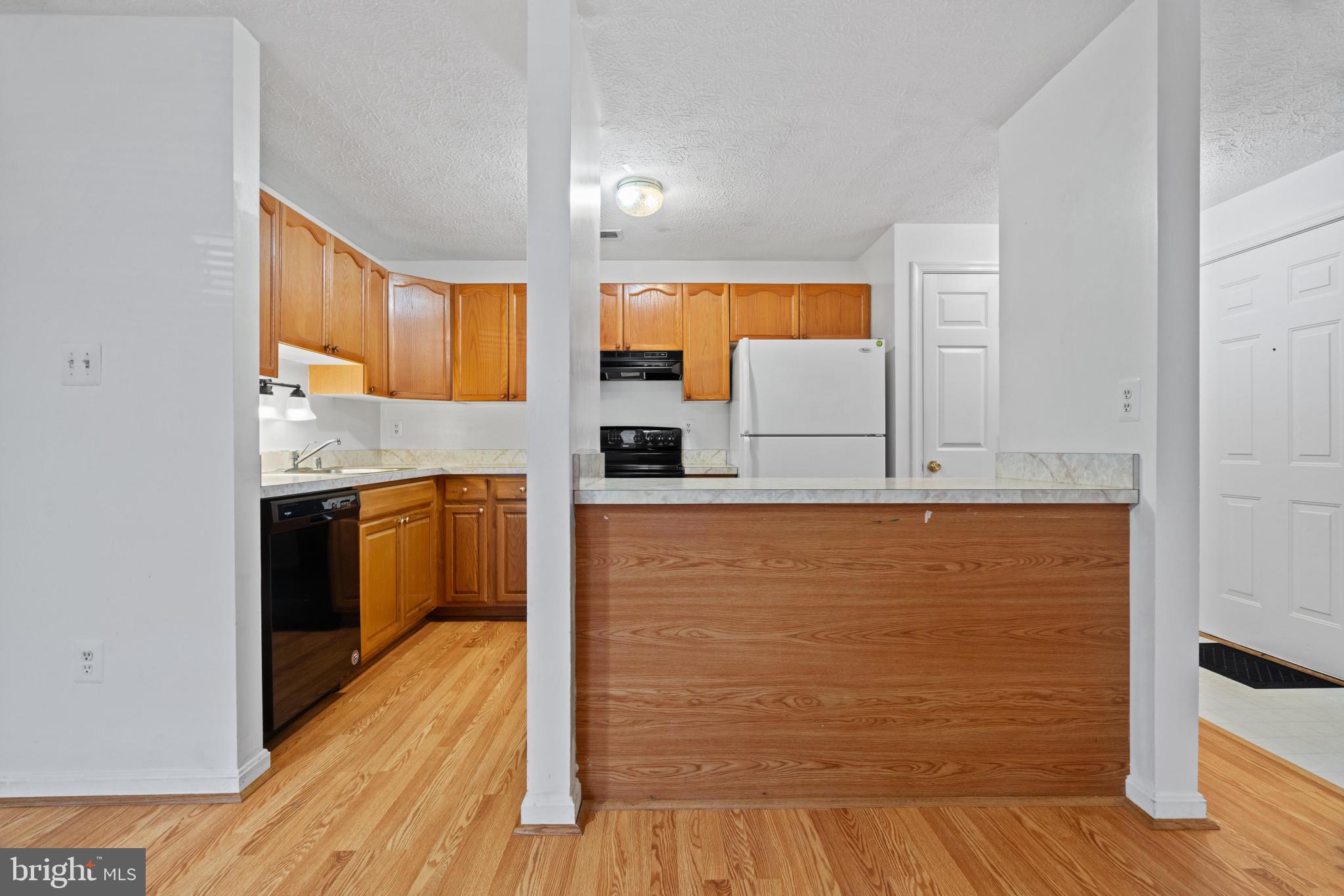2106 Whitehall Road, Unit BA Frederick, MD 21702 - Photo 6 of 12 Ample cabinetry in kitchen; separate dining