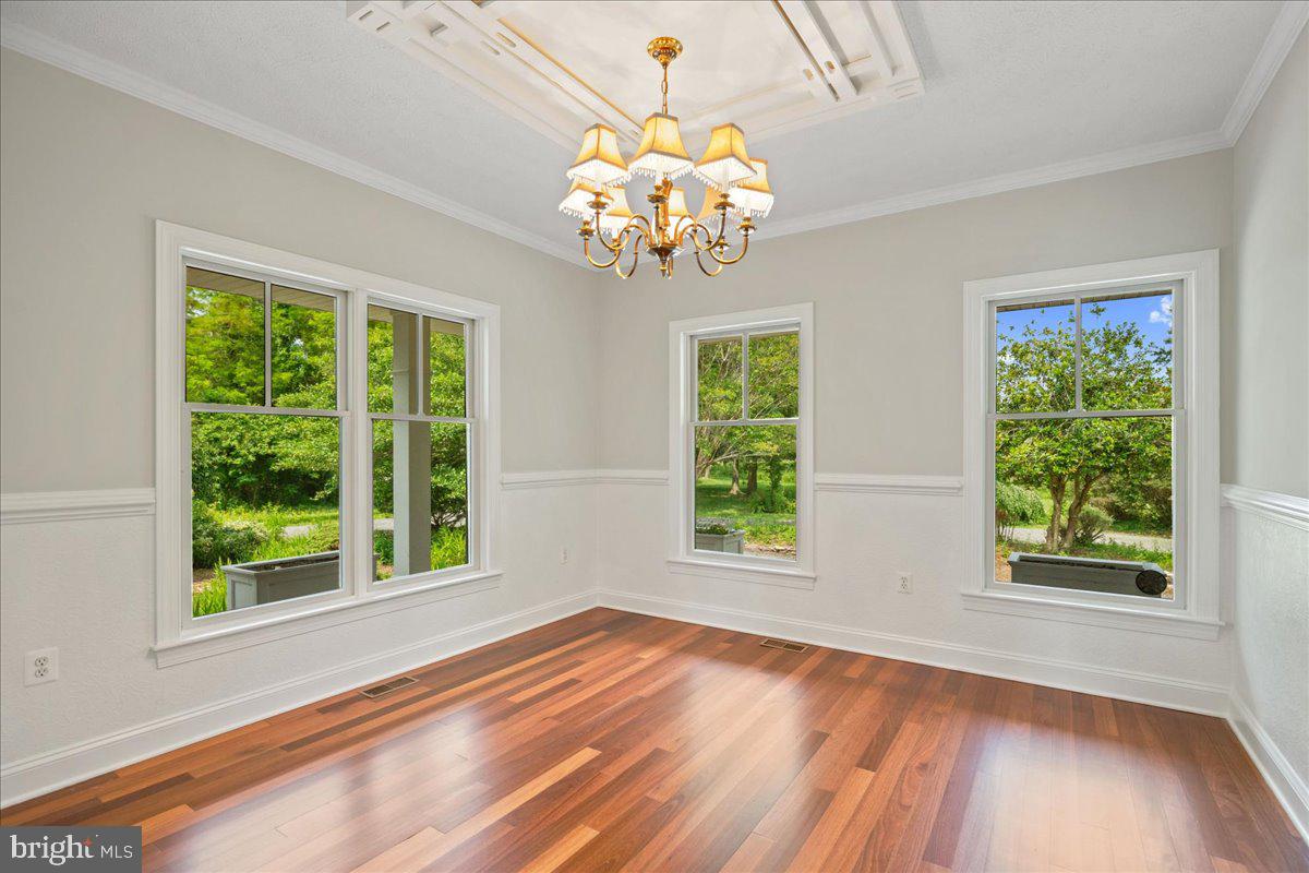 50447 Hays Beach Road Scotland, MD 20687 - Photo 27 of 77 The corner dining room with specialty trim work.