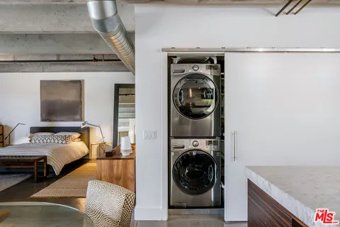 a view of living room washer and dryer