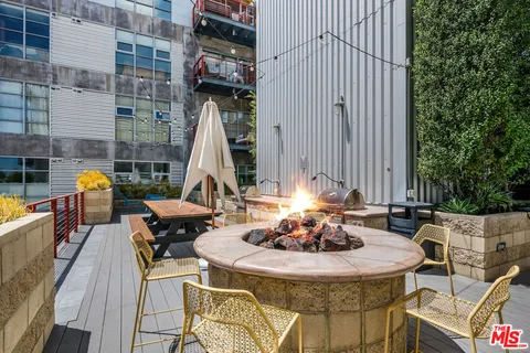 a view of a table and chairs in the patio
