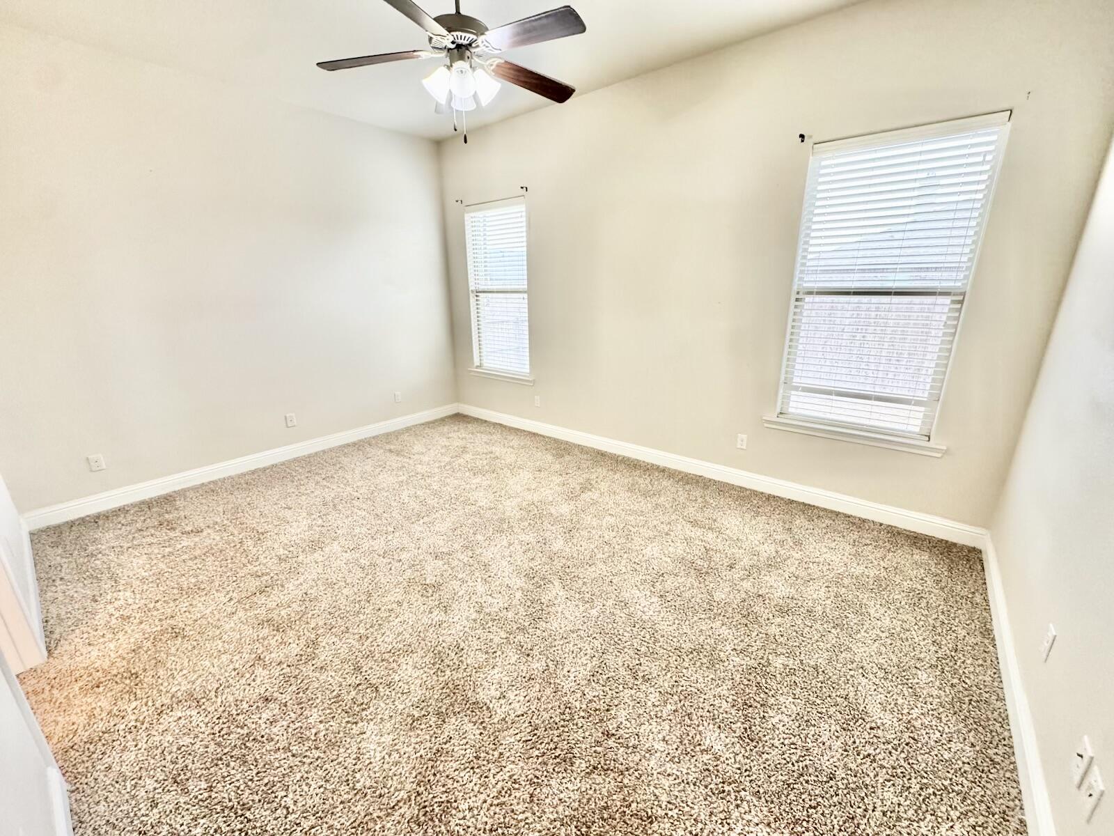 13801 Avenue West Lubbock, TX 79423 - Photo 7 of 17 an empty room with a window