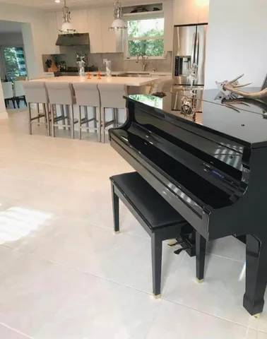 a living room with furniture and a table