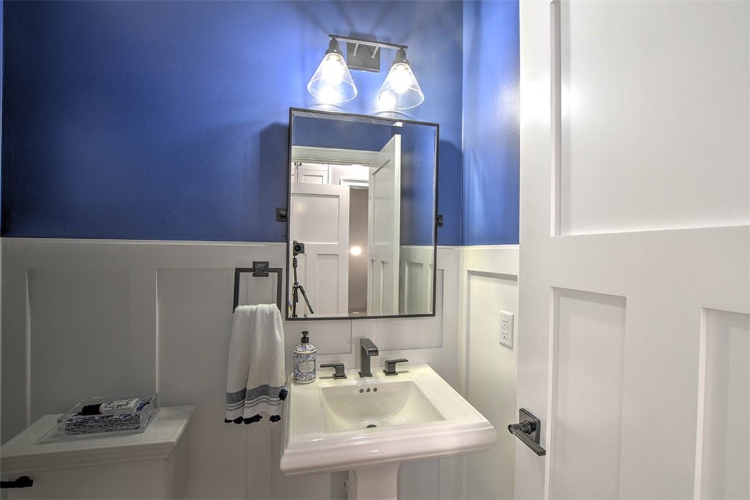6323 Autumn Ridge Court Decatur, IL 62521 - Photo 21 of 43 a bathroom with a sink and a mirror