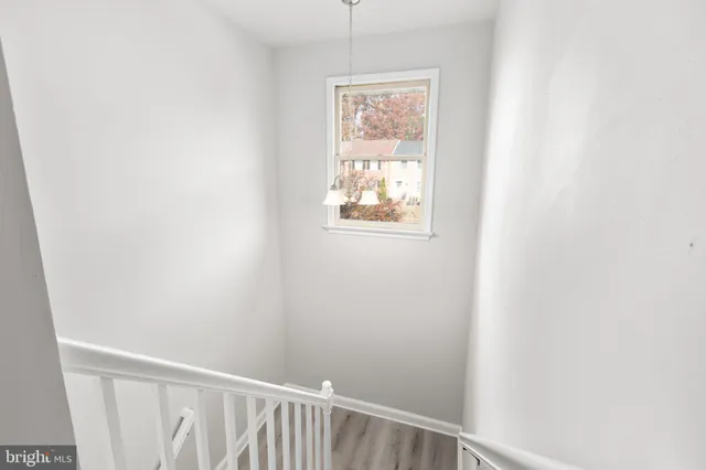 a view of a hallway with window