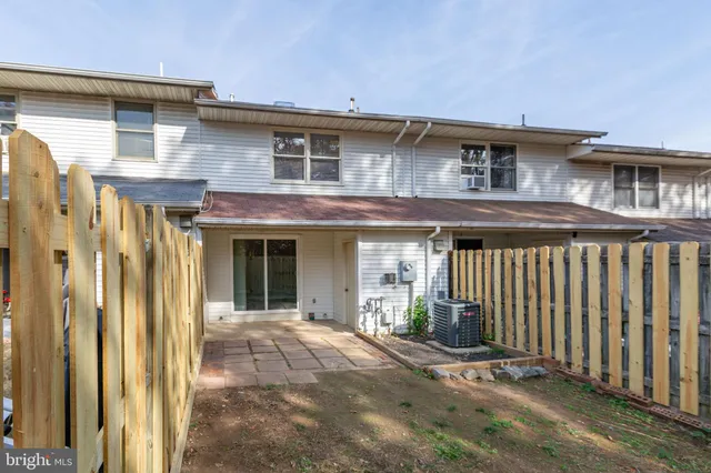 a front view of a house with a porch