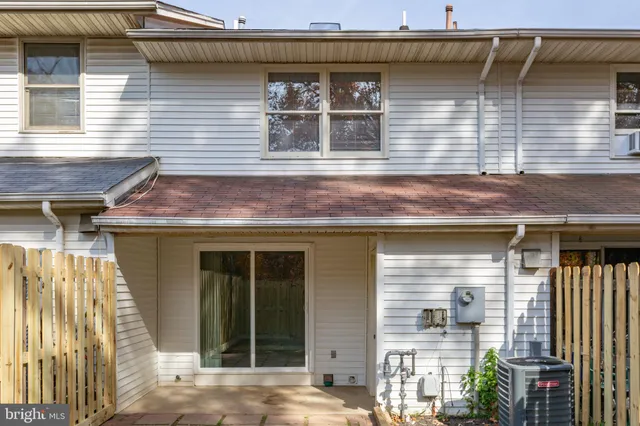 a front view of a house with parking