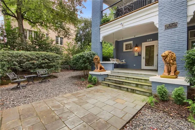 a view of house with yard