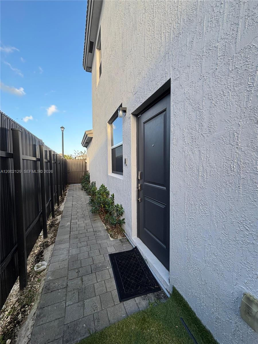 16144 Southwest 148th Place Miami, FL 33187 - Photo 24 of 29 In-laws suite