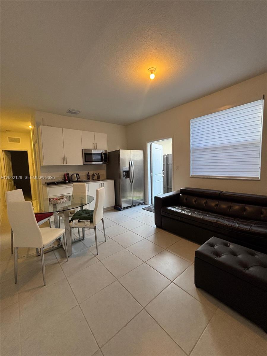 16144 Southwest 148th Place Miami, FL 33187 - Photo 25 of 29 In-laws suite