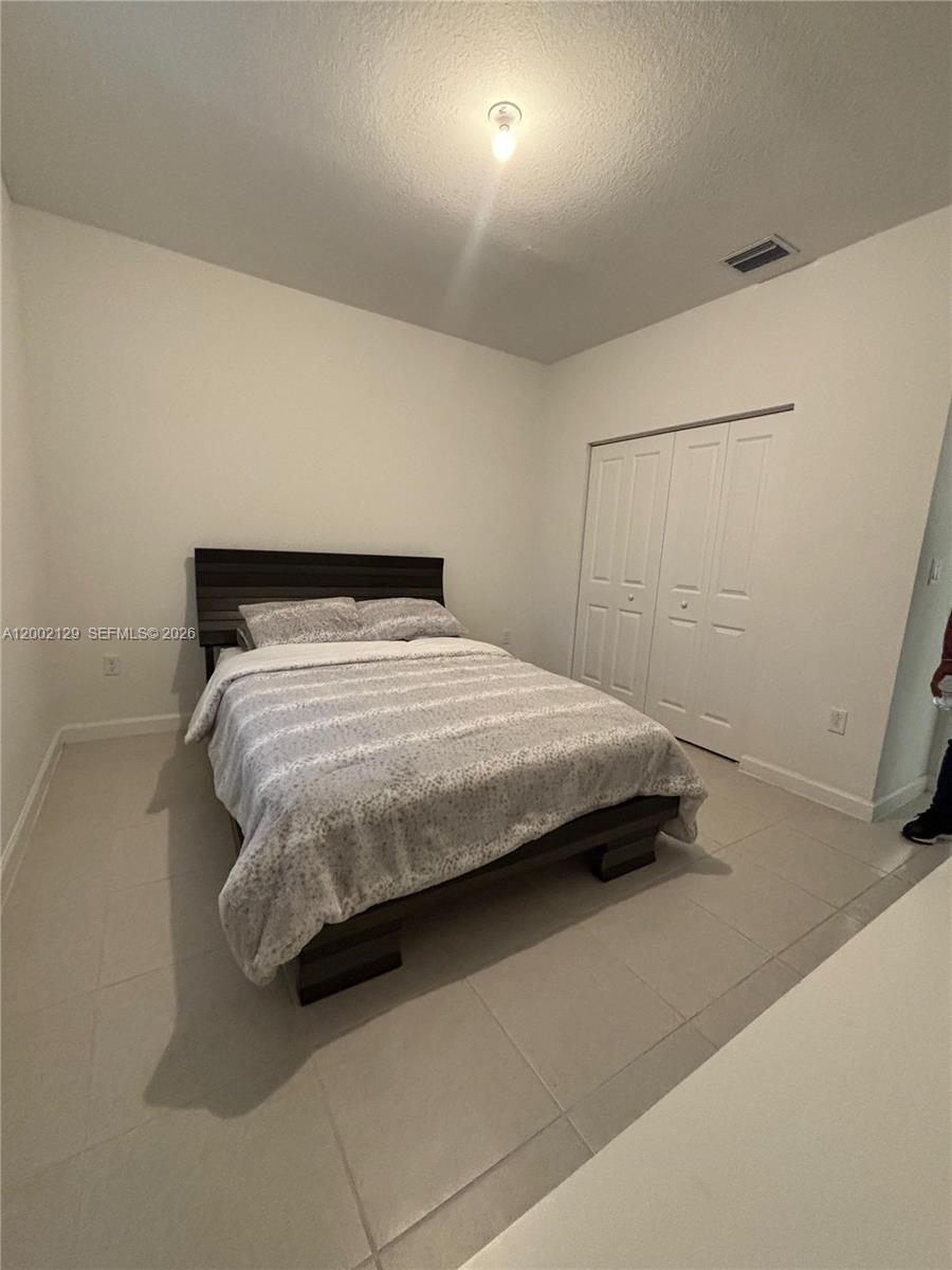 16144 Southwest 148th Place Miami, FL 33187 - Photo 27 of 29 In-laws suite