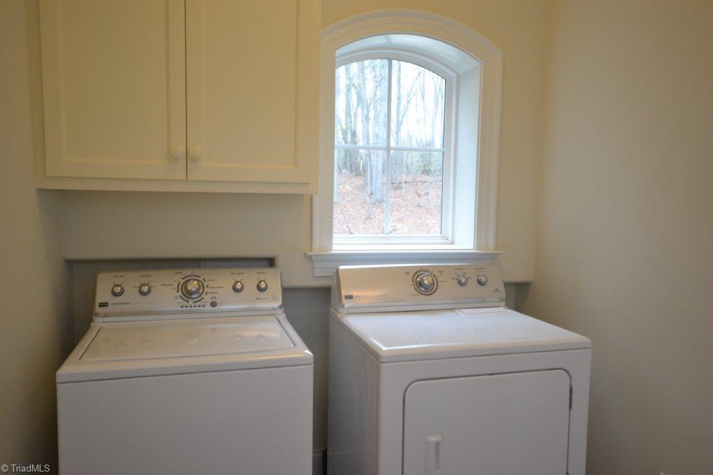 4958 Tigers Den Road Randleman, NC 27317 - Photo 9 of 25 Laundry Room - Cabinet Storage