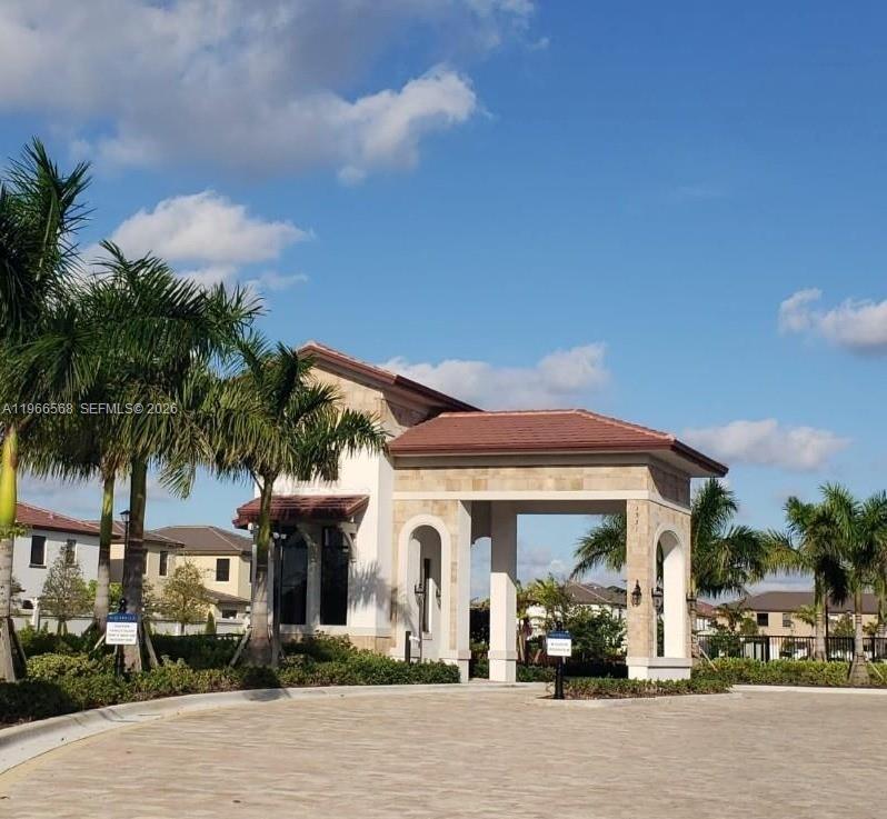 3350 Northwest 112th Street Hialeah, FL 33018 - Photo 2 of 40 a front view of a house with a garden