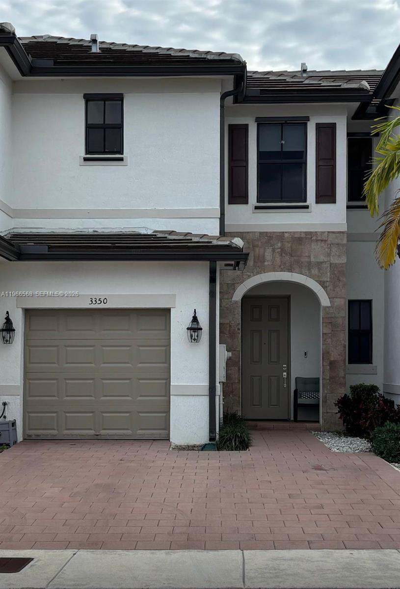 3350 Northwest 112th Street Hialeah, FL 33018 - Photo 3 of 40 a front view of a house